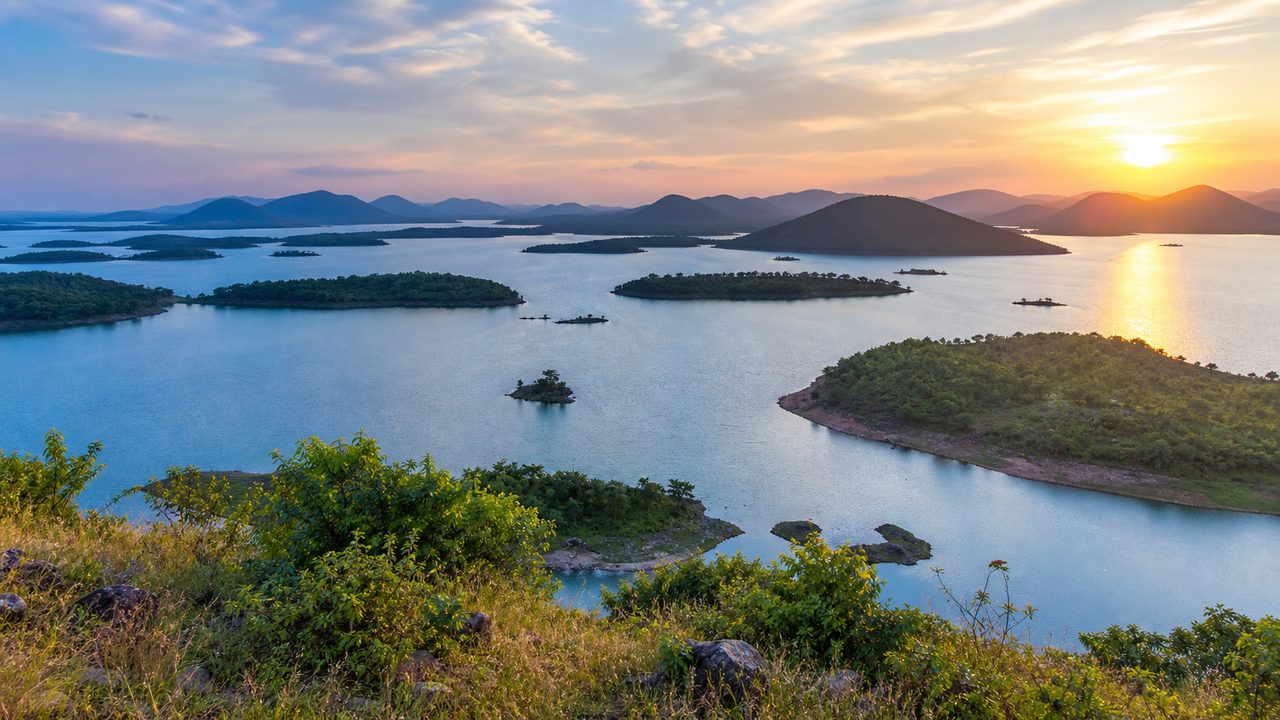 Hirakud Reservoir islands and hills near Sambalpur at sunset